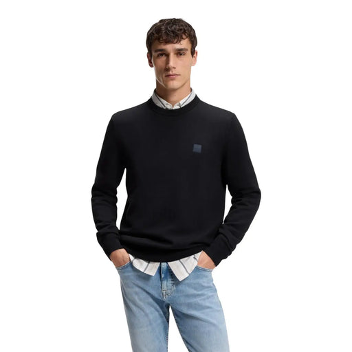 Boss cashmere sweater Kanovano for men in black with dark gray square logo on left chest, front view