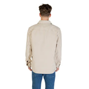 Boss Men Classic Beige Long Sleeve Round Neck Shirt worn over blue jeans