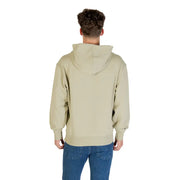 Men’s light olive green cotton hoodie with front pockets paired with blue jeans