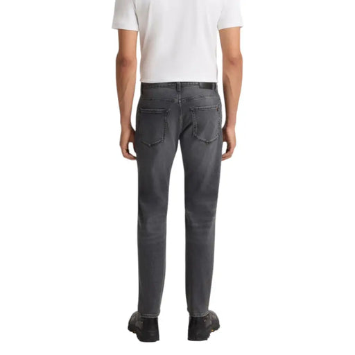 Charcoal gray slim fit jeans with a classic five-pocket design and belt loops.
