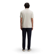 A man wearing a boss men polo shirt grey cotton zip neck short sleeve with a light beige classic collar and stitched seams