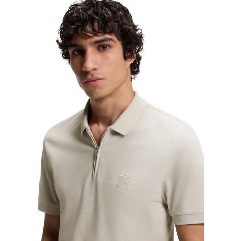 Beige boss men polo shirt in cotton with short sleeves and zipper placket featuring a subtle brand logo patch