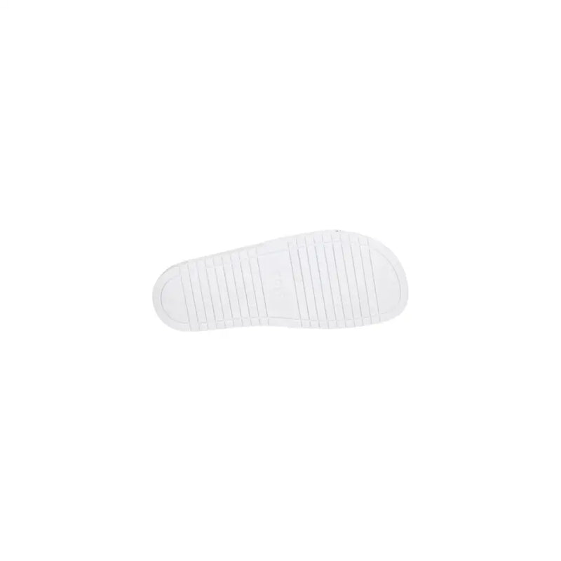 White rubber sole with textured ribbed pattern for grip on boss men slippers white logo print pvc spring summer