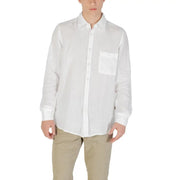Men’s white long-sleeve linen shirt with chest pocket paired with khaki pants for spring summer style