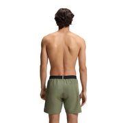 Olive green boss men swimwear athletic shorts with black elastic waistband designed for swimming and active use