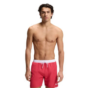 Red Boss men swimwear swim trunks with white elastic waistband and drawstring featuring boss logo on the lower right leg