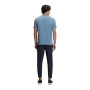 A man wearing a light blue boss men t shirt made of cotton stretch with short sleeves and crew neck