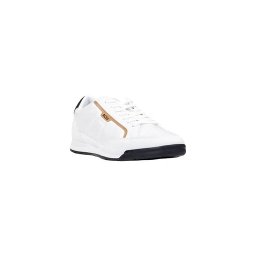 White leather sneaker with gold accents and black sole, possibly by reebok.