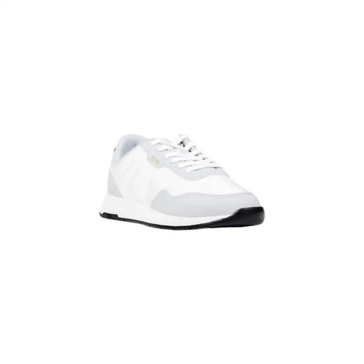 White patent leather sneaker with black sole and laces, nike air max design.