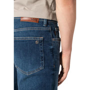 Boss slim fit jeans Ogden for men in dark blue denim with brown leather brand patch, back view