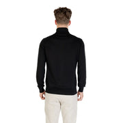 Boss wool turtleneck sweater for men in black with smooth fitted silhouette and ribbed cuffs, front view