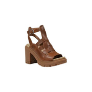 Brown leather heeled sandal displayed in the product image showing elegant footwear style
