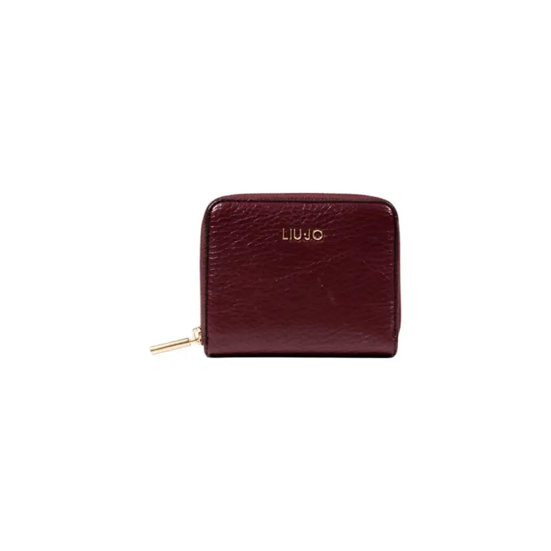 Burgundy shiny leather wallet with zipper closure for secure storage