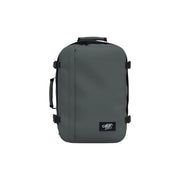 Dark gray Cabin Zero carry-on suitcase with black handles and straps made of durable polyester material