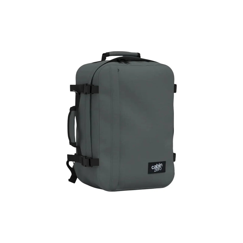 Gray cabin zero carry-on suitcase with black straps and handle made of durable polyester for versatile travel use