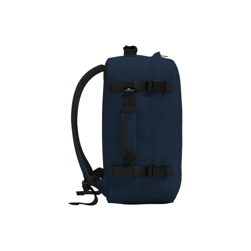 Deep navy blue travel duffel bag with black straps and buckles made of polyester for cabin zero men classic rucksack 36l