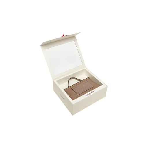 Calvin Klein beige polyurethane leather mini handbag with zip presented in a white gift box