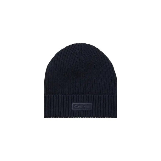 Black ribbed knit beanie with columbia logo patch