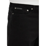 Calvin Klein black cotton stretch men shorts with sleek dark denim finish and silver toned button details