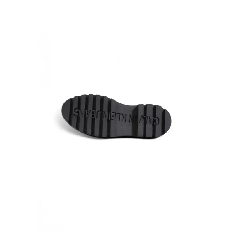 Calvin Klein black lace up women’s shoes featuring a black rubber sole with embossed Calvin Klein Jeans branding