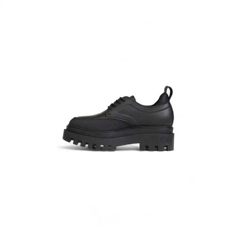 Calvin Klein black leather lace up women’s shoe with chunky textured rubber sole for casual wear