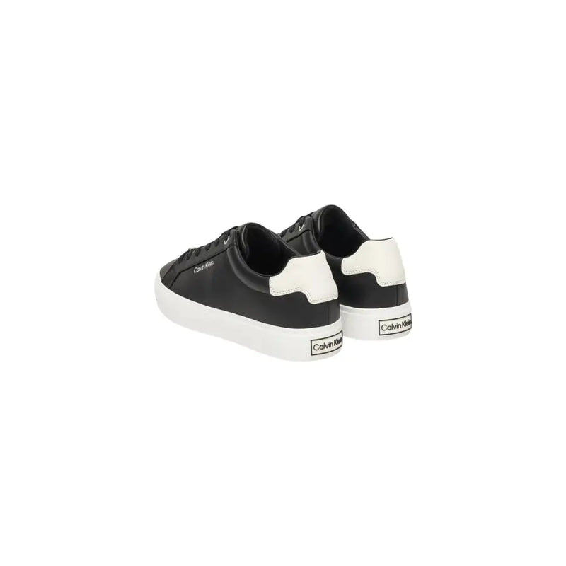Calvin Klein black and white low-top leather sneakers with contrasting rubber sole for women slip on style