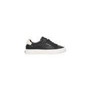 Calvin klein black leather slip on sneakers for women showing low-top design with white rubber sole and heel tab