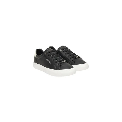 Calvin Klein black leather slip-on sneakers for women with white soles