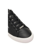 Calvin Klein black leather slip on sneakers for women with white rubber sole and silver metal lace lock