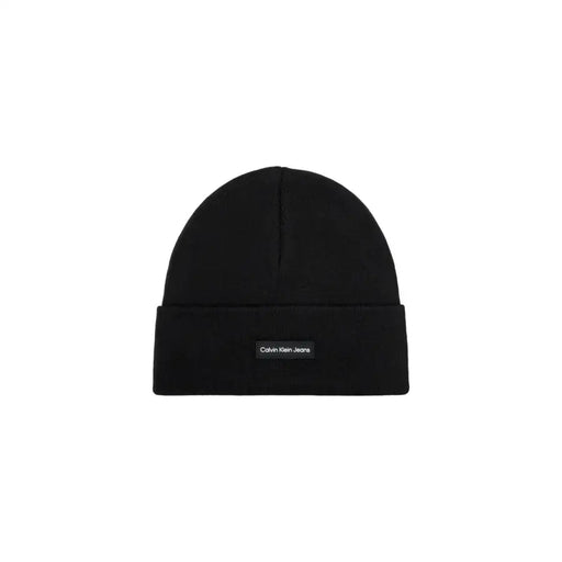 Black calvin klein beanie with logo label.
