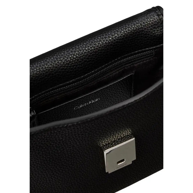 Calvin Klein black textured leather crossbody bag with silver-toned rectangular clasp and shoulder strap