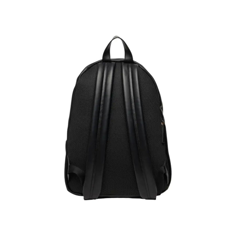 Calvin Klein black rucksack with smooth leather straps mesh back panel and zip pockets shown from the back side