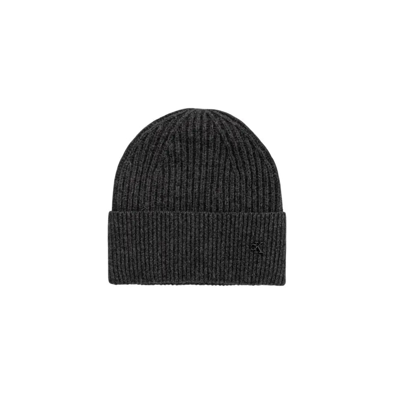 Charcoal gray ribbed beanie with calvin klein logo.