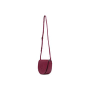 A sleek burgundy leather Calvin Klein crossbody bag with minimalist ck logo for women