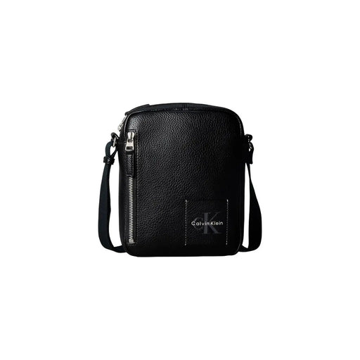 Calvin Klein crossbody bag Bold Pebble for women in black textured leather with silver zipper hardware, front view
