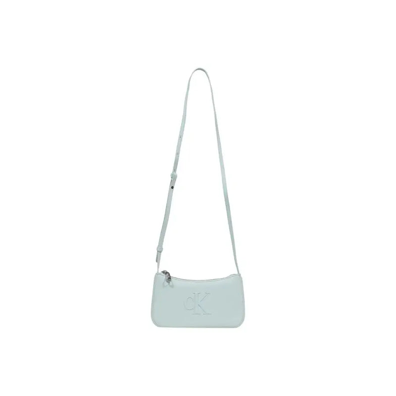 A light mint green Calvin Klein polyurethane crossbody shoulder bag with zip pockets and a matching minimalist strap