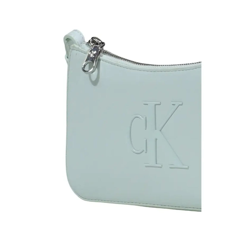 Calvin Klein green polyurethane shoulder bag with zip pockets featuring a light mint green pouch and embossed CK logo