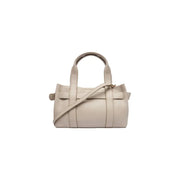Calvin Klein beige leather handbag with structured design and top handle featuring an inside pocket