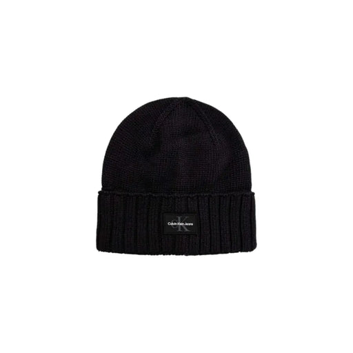 Black calvin klein ribbed beanie with logo label.