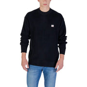 Calvin Klein Jeans black cotton ribbed knit sweater with small red and white logo patch on the left chest