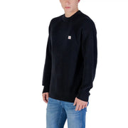 Calvin Klein Jeans black cotton ribbed knit sweater with small white logo patch on the chest