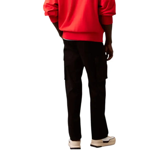 Black cargo pants with side pockets from Calvin Klein Jeans for fall winter men collection