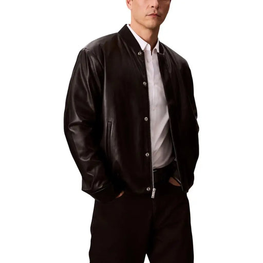 Calvin Klein Jeans black long mens fall winter leather bomber jacket with silver buttons zipper and pockets