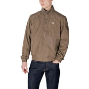 Men’s brown Calvin Klein full-zip bomber jacket displayed with Calvin Klein Jeans Green Zip Front Mens Long Blazer