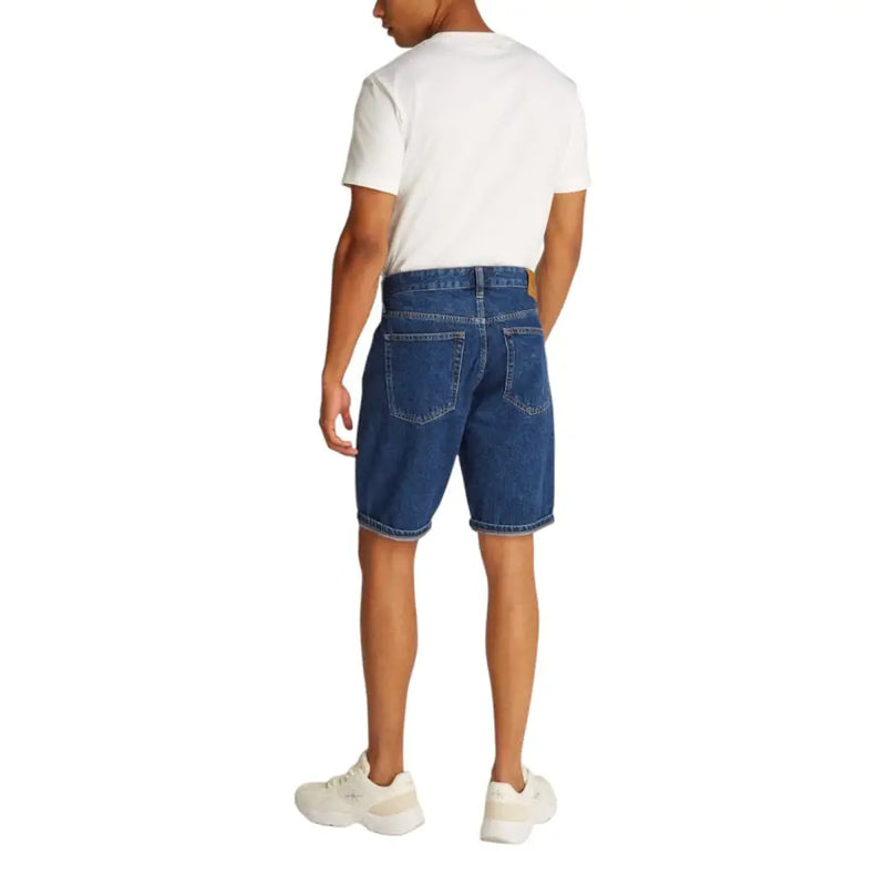Calvin Klein Jeans light blue cotton shorts for men featuring blue denim with classic five-pocket design and faded wash