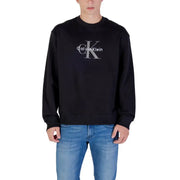 Men’s black Calvin Klein sweatshirt paired with blue jeans, showcasing casual style