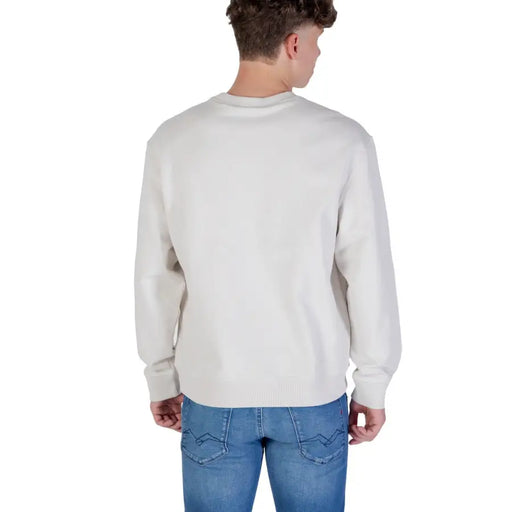 Men’s beige long-sleeved crewneck sweatshirt with blue jeans, Calvin Klein Jeans product