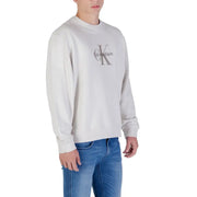 Men’s light gray Calvin Klein Jeans long sleeve crewneck sweatshirt with faint logo