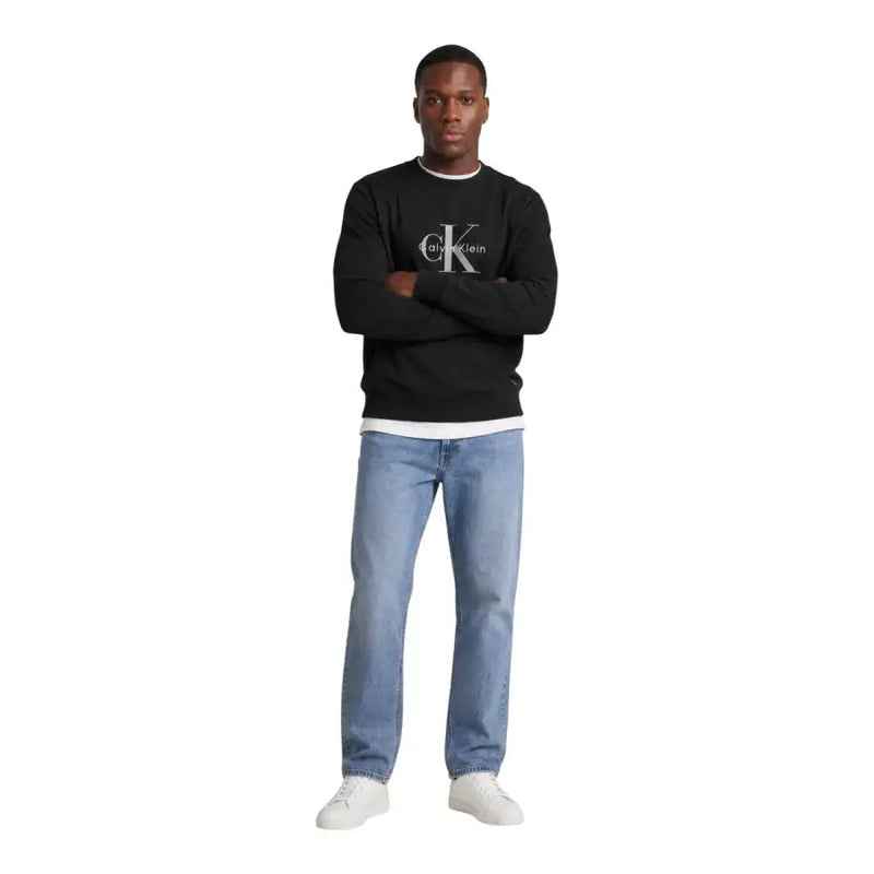 Calvin Klein Jeans Schwarzes Herren-Sweatshirt aus Baumwolle mit Rundhalsausschnitt, weißem Logo und gerippten Bündchen
