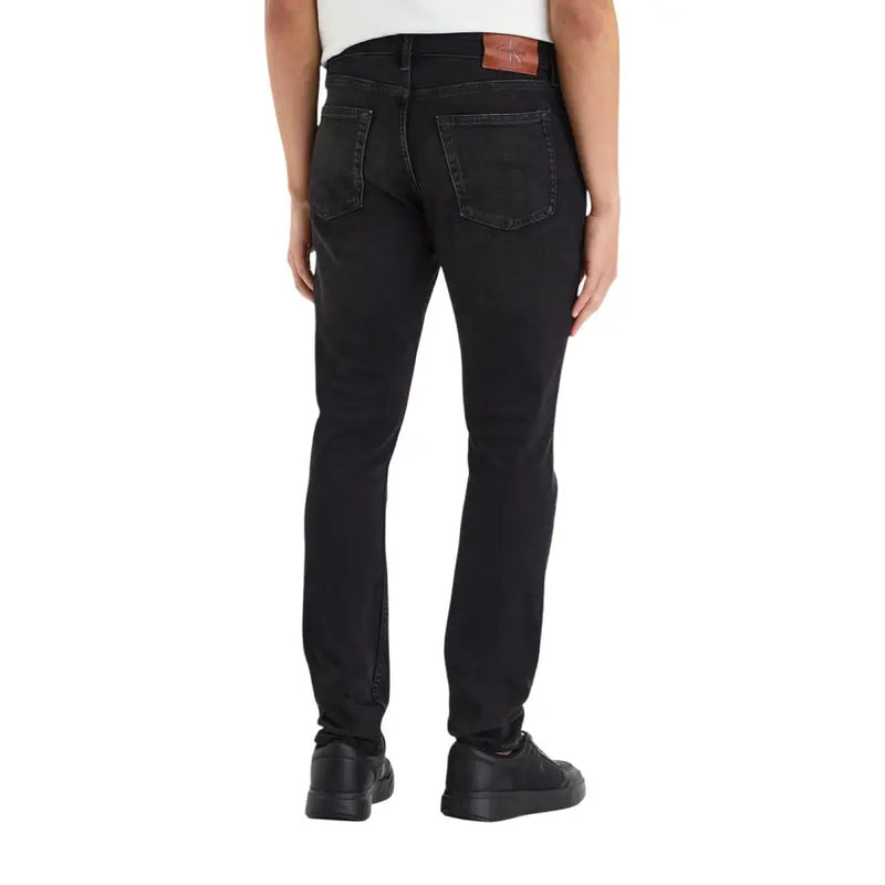 Calvin Klein jeans men black cotton denim slim jeans with slim fit and subtle fading on the thighs